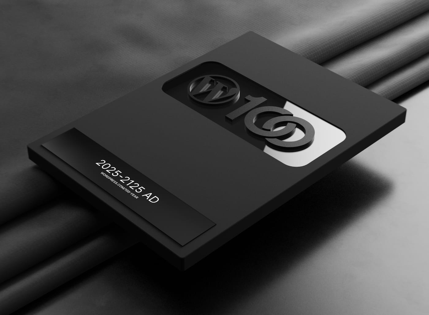 The matte black placard with the 100 year logo and the dates 2025-2125 ad